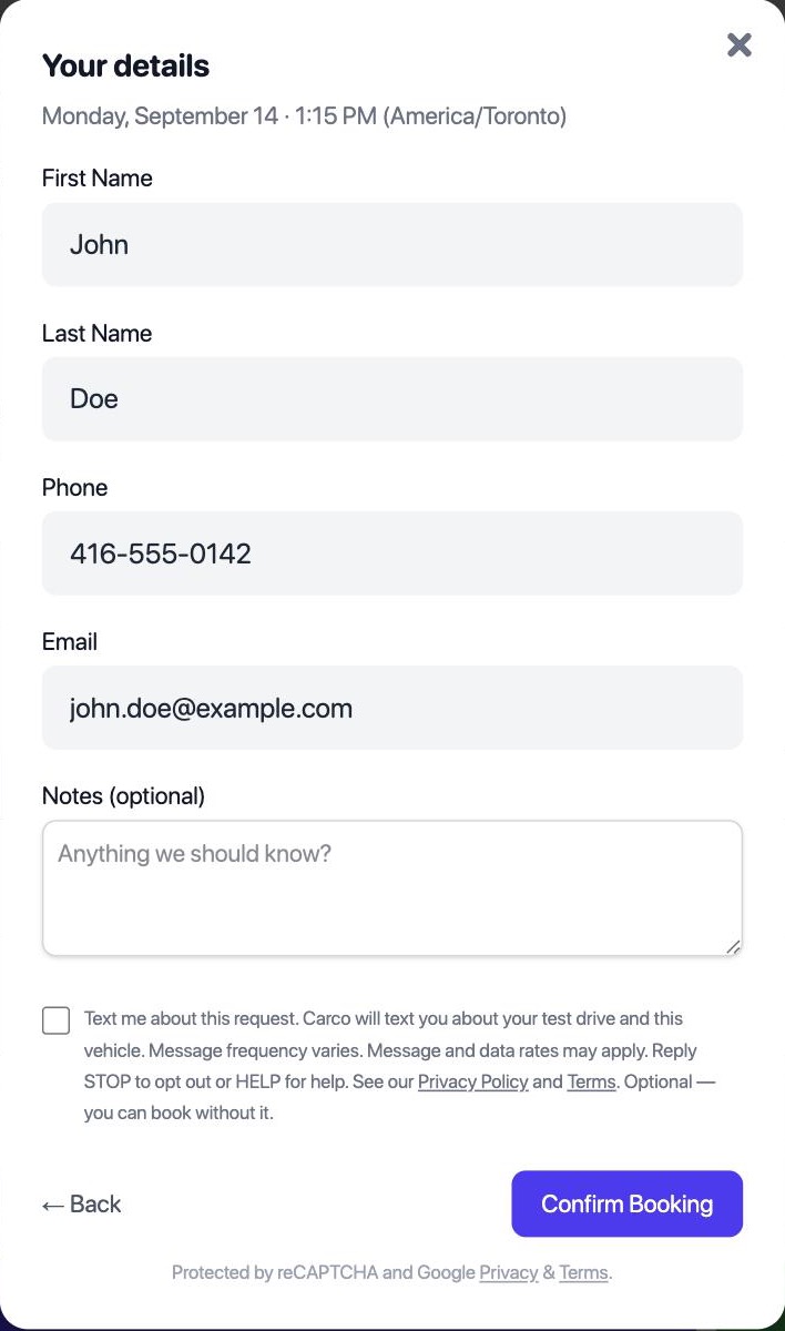 The Your details step of Carco's test drive booking form, showing the optional SMS consent checkbox unchecked by default beneath the name, phone and email fields, with the Confirm Booking button enabled.